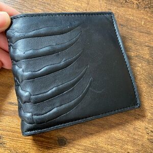 Alexander McQueen claw leather wallet slightly worn